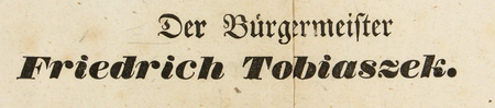 Z akt Magistratu Miasta Krakowa ogłoszenie publiczne z grudnia 1853 roku z wezwaniem do mieszkańców, aby w miejsce
wysyłania noworocznych powinszowań zasilali fundusz dla ubogich, podpisane przez burmistrza Fryderyka Tobiaszka –
oraz powiększenie zapisu imienia i urzędu (Archiwum Państwowe w Krakowie, sygn. Mag II 459, s. 1550–1551)